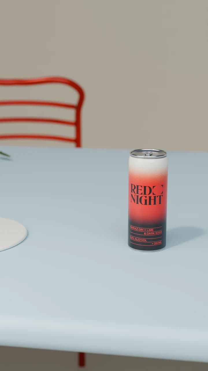 Red Night can on a sky-blue table in daylight